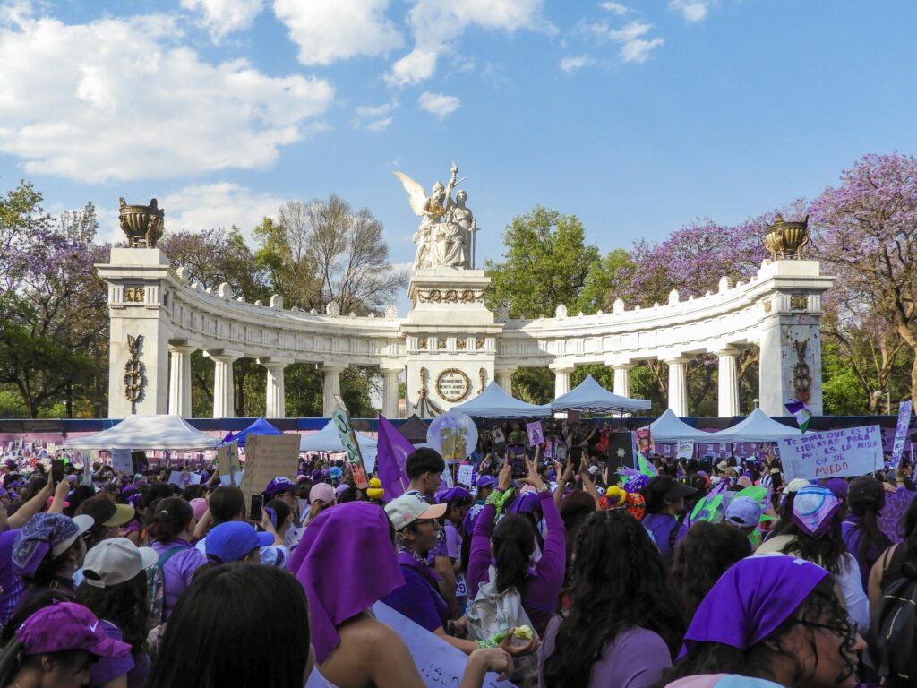 Vibrant women's rights protest at Hemiciclo a Juárez, Mexico City.